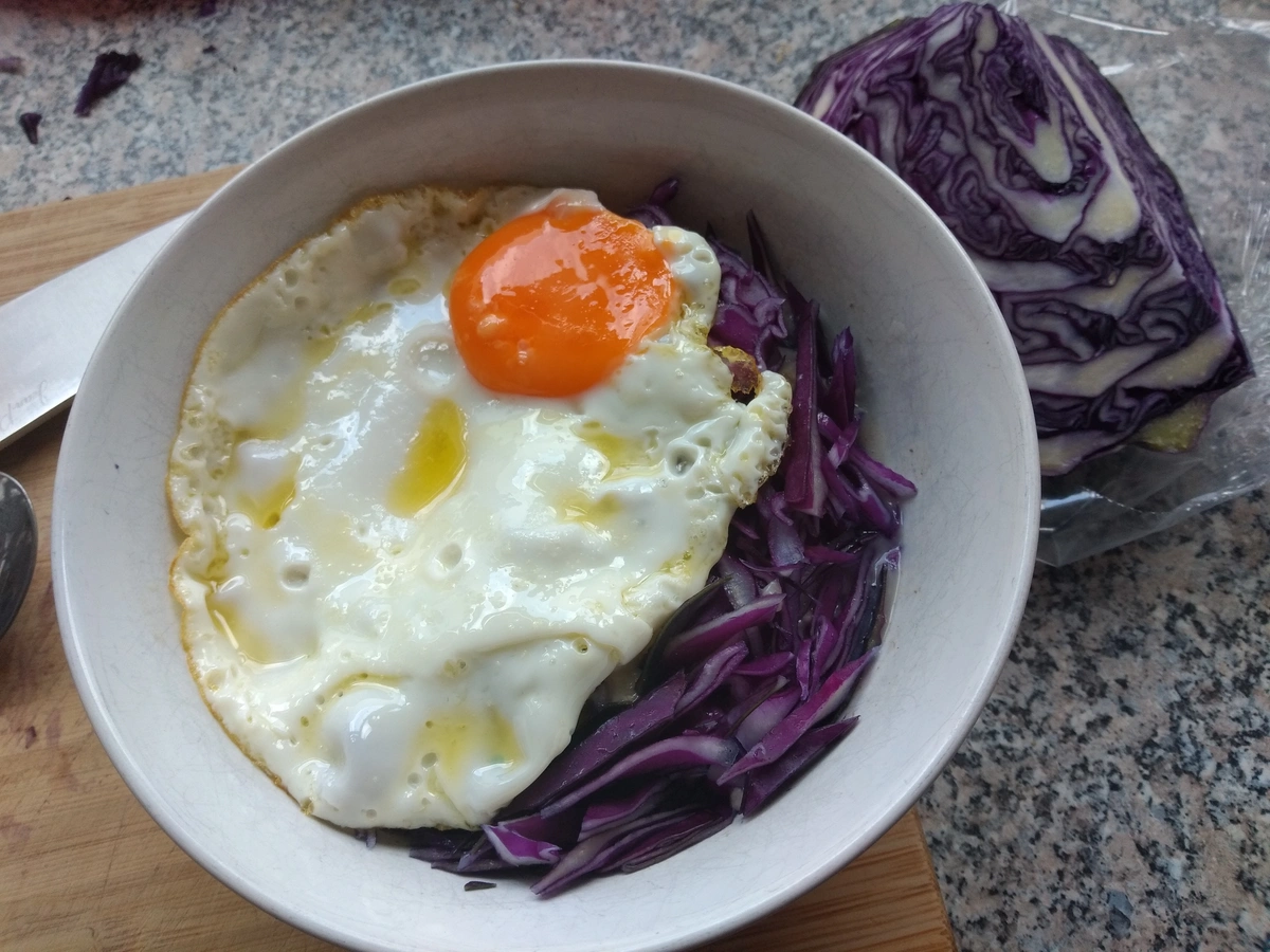 Photo of Red Cabbage Porridge with Fried Egg